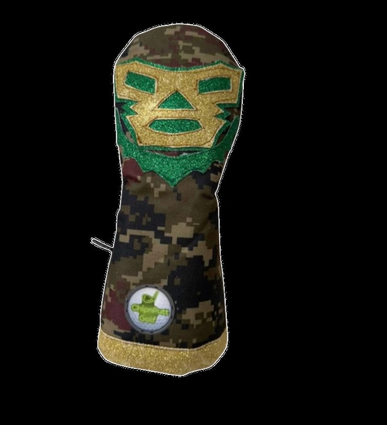 Decorative golf headcover with green and gold glittery mask face design on camouflage patterned fabric body