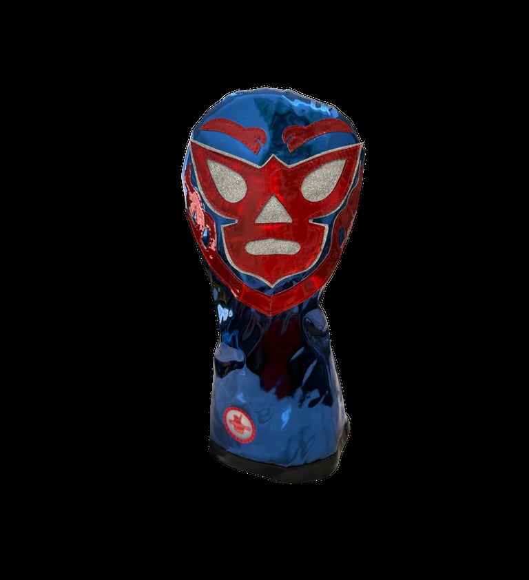 Red and blue lucha libre wrestling mask toy with bold facial features and serious expression